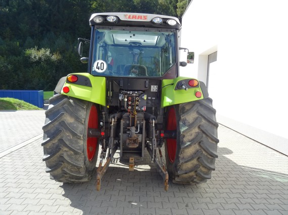 Traktor CLAAS AXOS 310 ze zadu